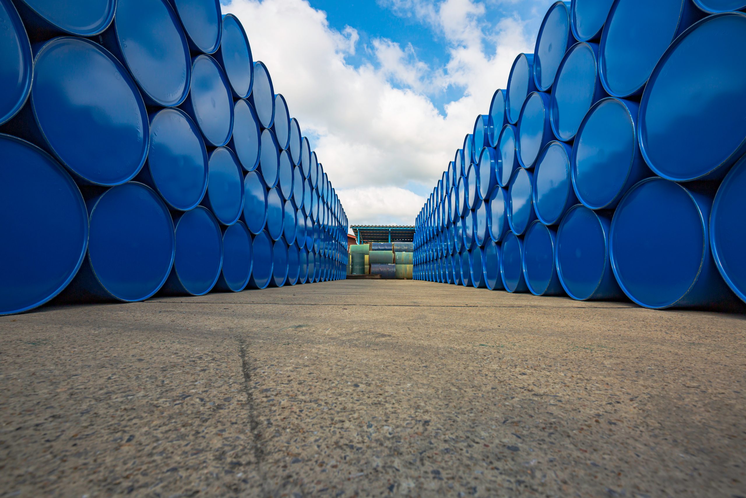 Oil,Barrels,Blue,Or,Chemical,Drums,Horizontal,Stacked,Up drum Container is in a third party logistics store